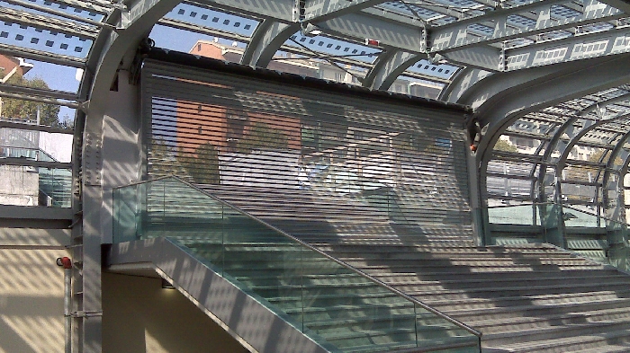 Serrande microforate P97 Traspar. Chiusure accesso Stazione Ferroviaria, Torino